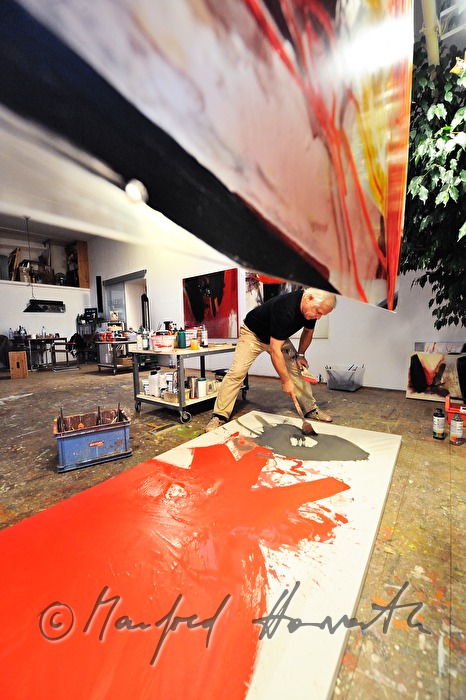 Sepp Laubner painting in his studio