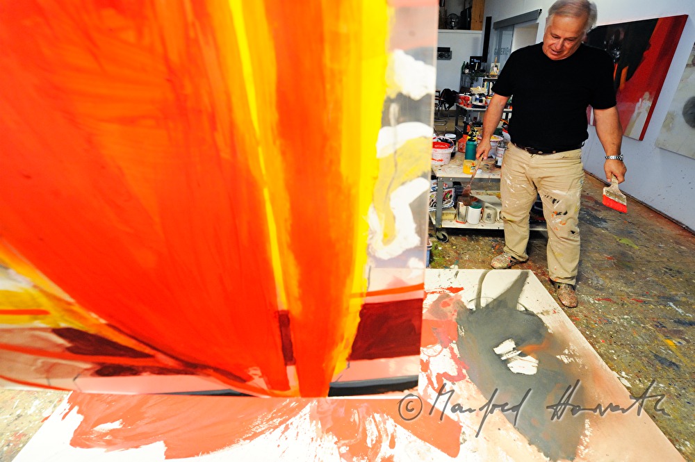Sepp Laubner painting in his studio