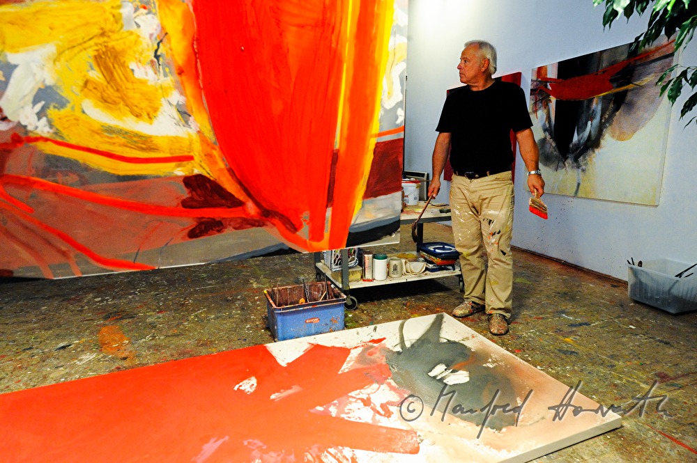 Sepp Laubner painting in his studio