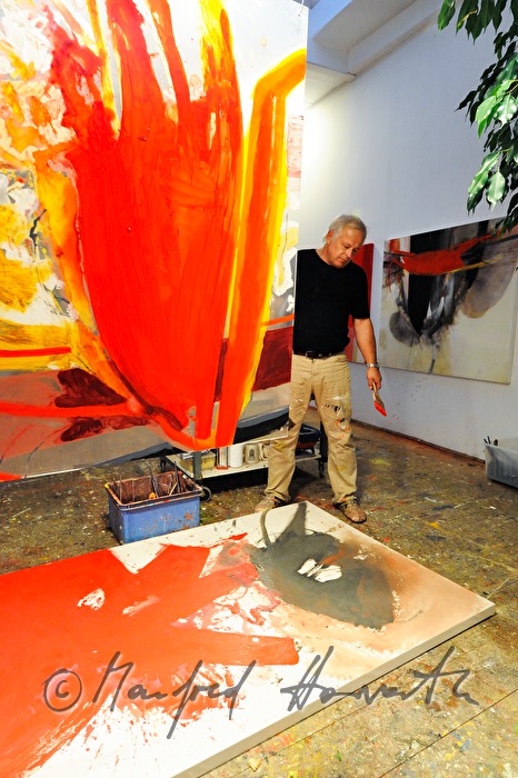 Sepp Laubner painting in his studio