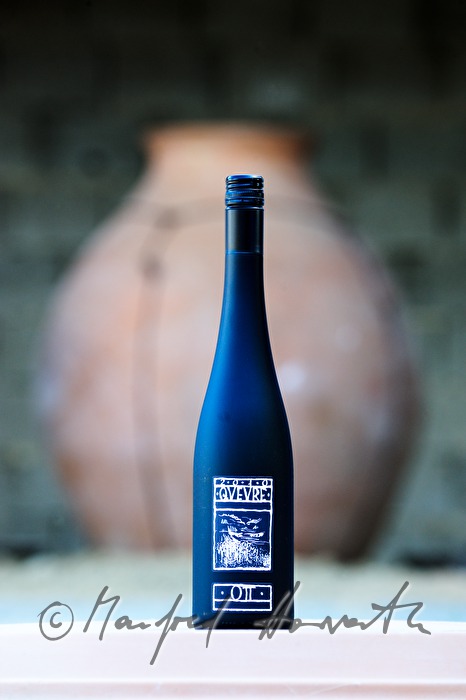 amphora and a bottle of amphora wine