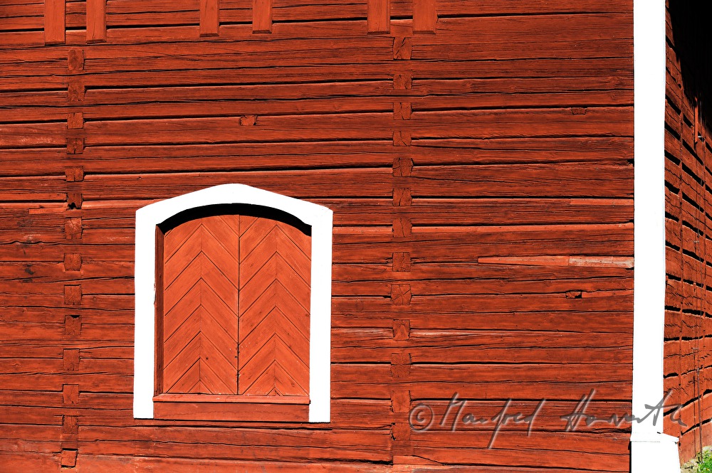 window of a wooden church