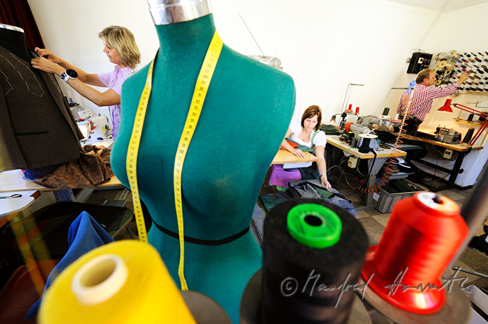 tailor in his workshop at 