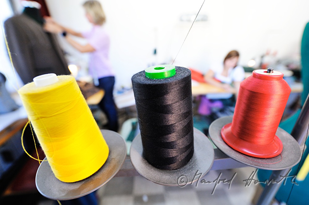tailor in his workshop at 