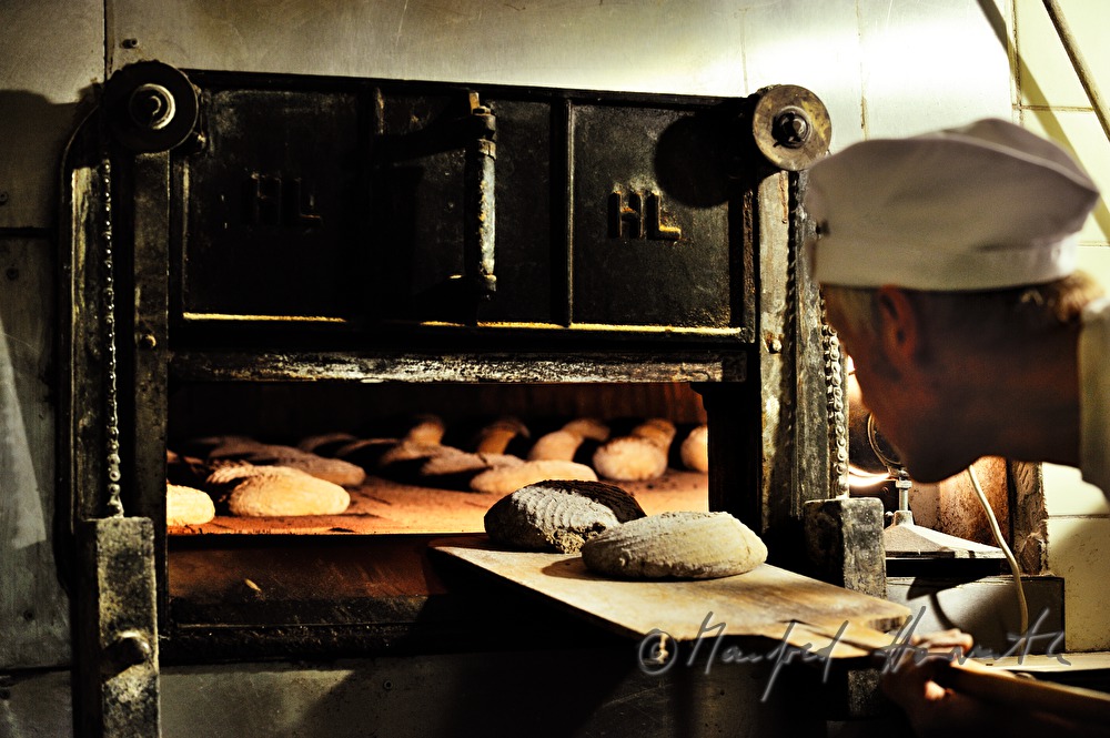 view into the baker's oven with breads inside
