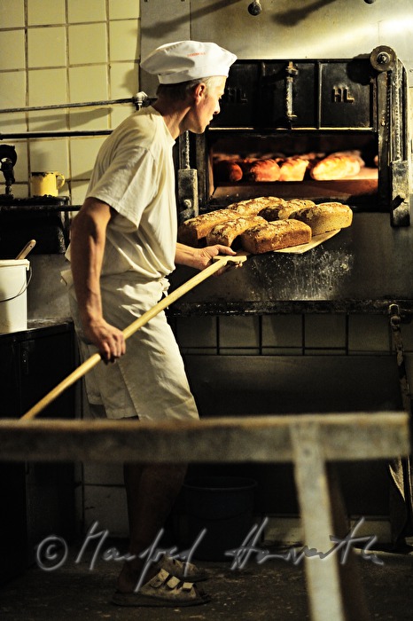 view into the baker's oven with breads inside