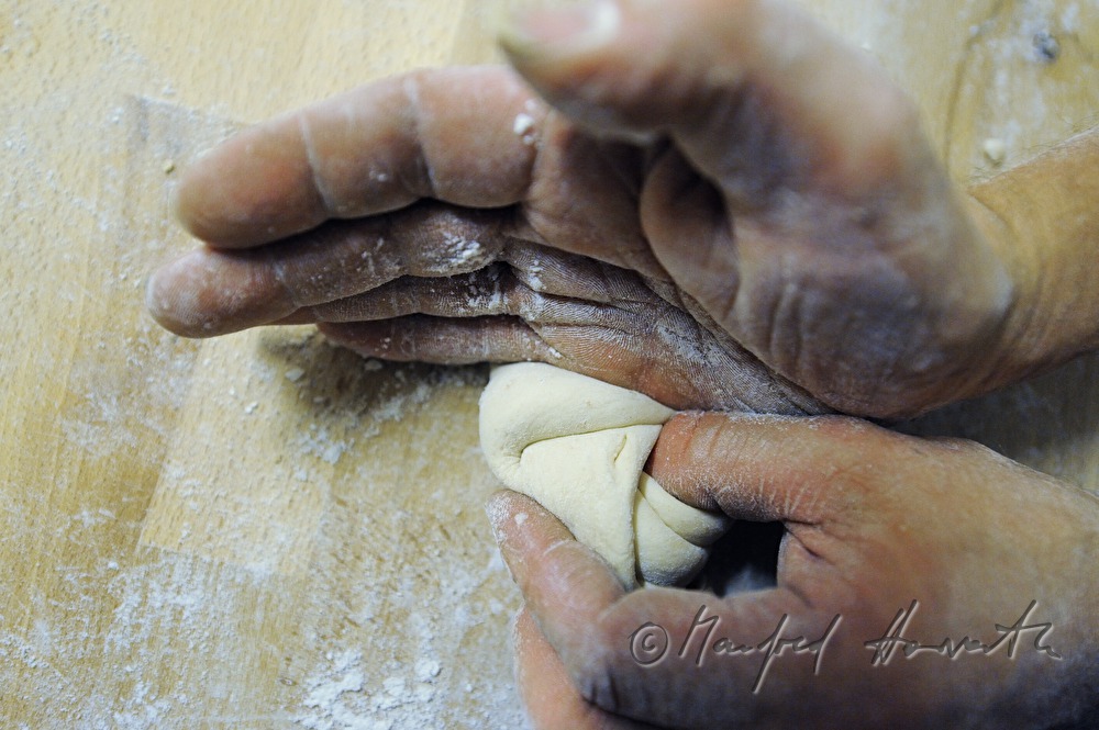 forming of a handmade hard roll