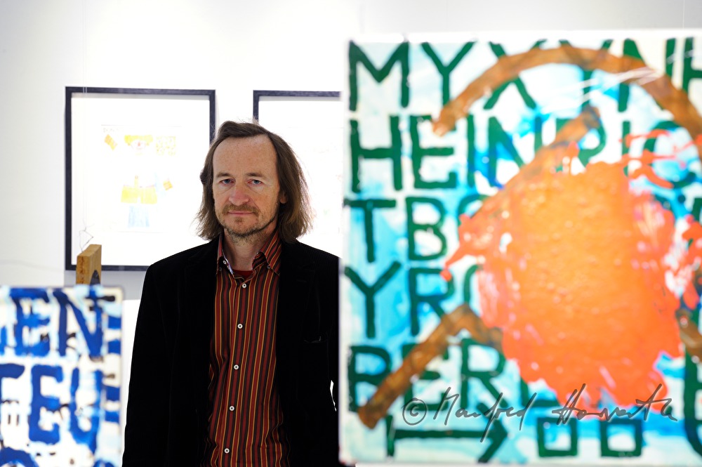 Director Johann Feilacher in an exhibition hall