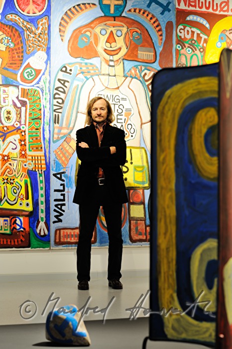 Director Johann Feilacher in an exhibition hall