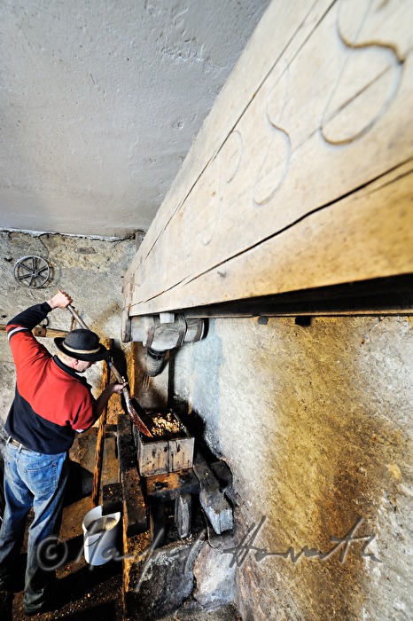 making cider in the cellar of a farm house