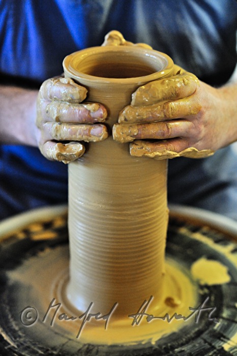 potter Joef Wieser working on the pottery wheel