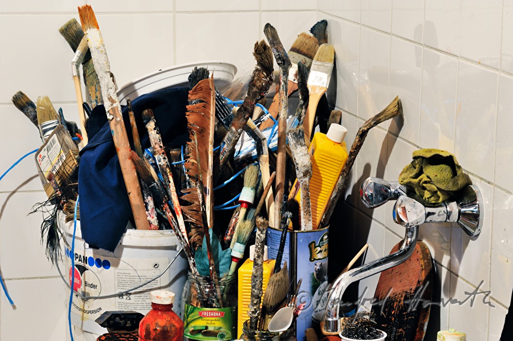 paint-brushes  in the studio of the paintress