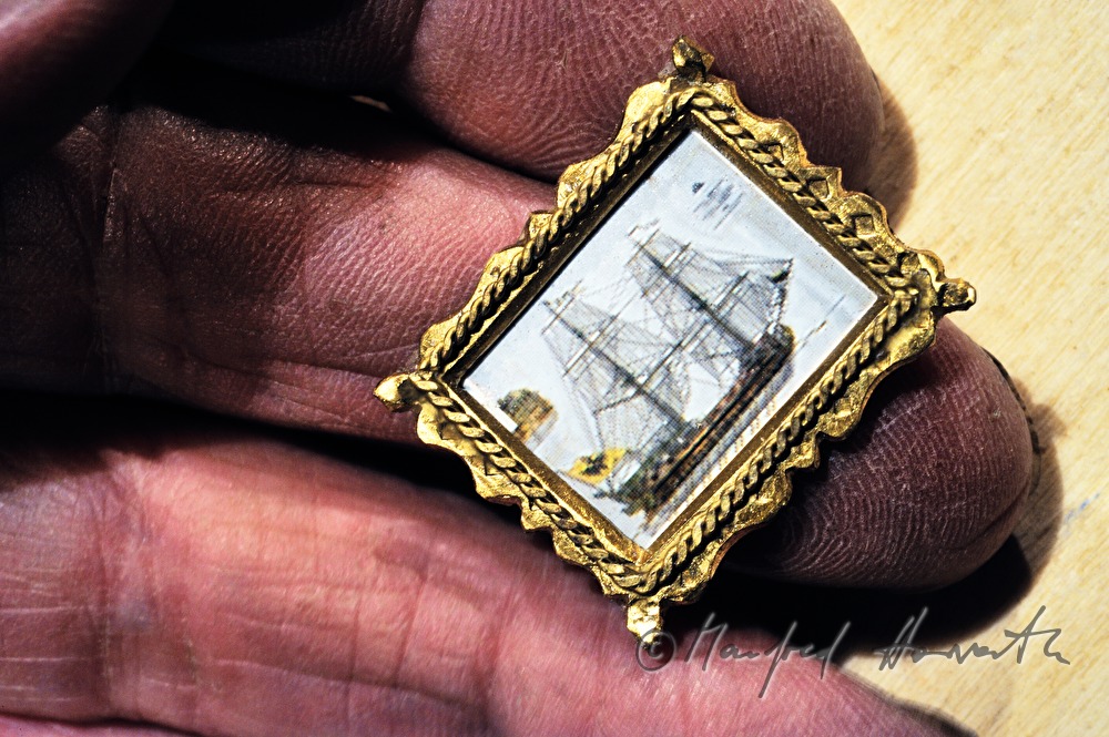 ship scale model maker Kurt Schaefer with picture frame