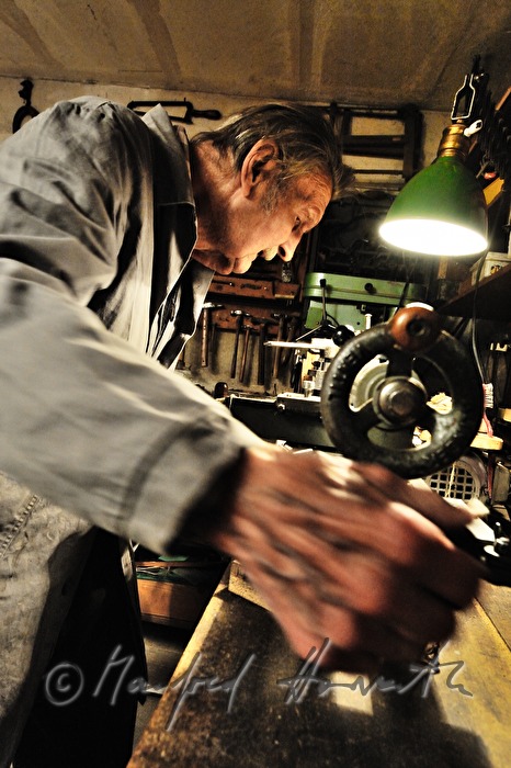 ship scale model maker Kurt Schaefer with engine lathe