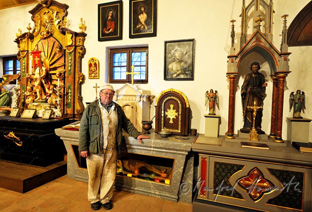 Josef Geisler in his museum for ecclesiastical art