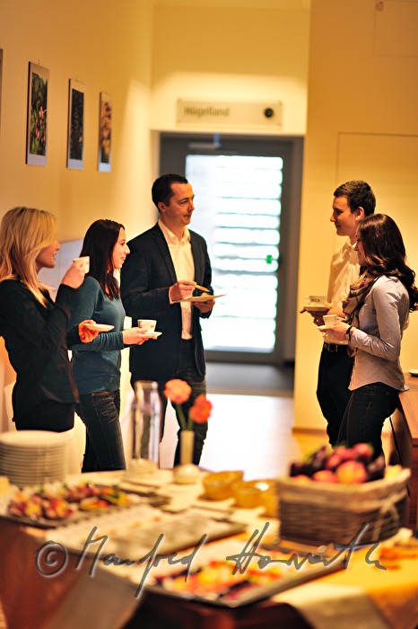 attendants of a seminar near the buffet