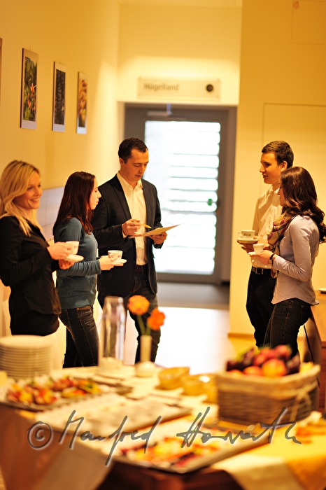 attendants of a seminar near the buffet