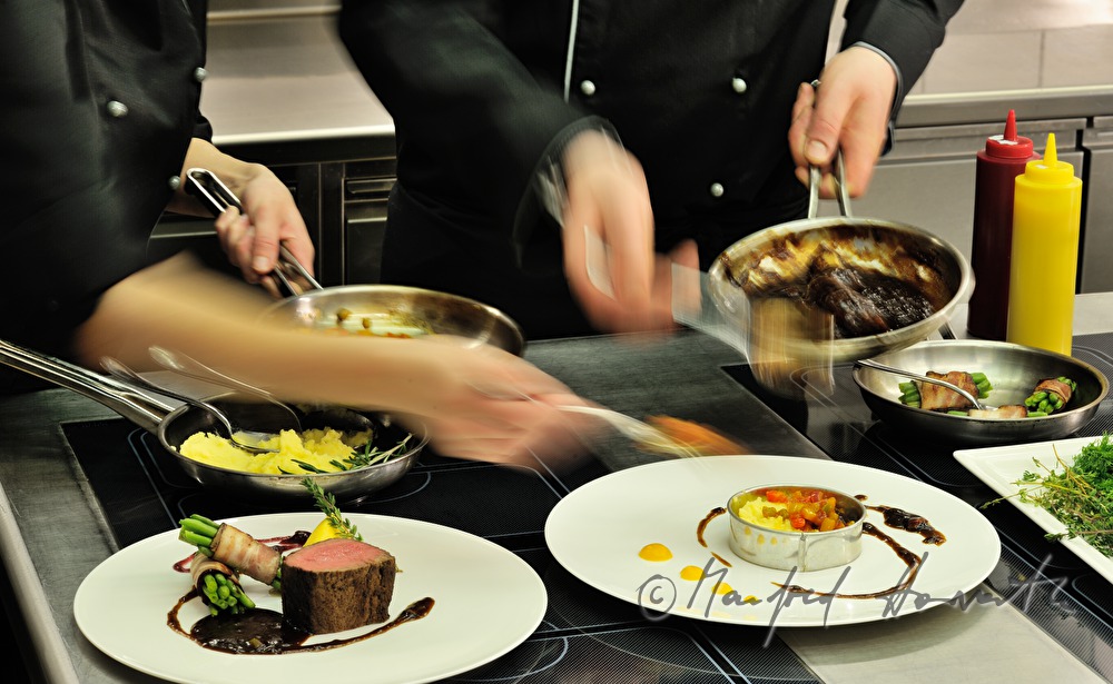 chefs preparing beef