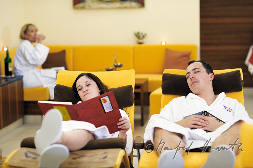 couple rests after a sauna visit