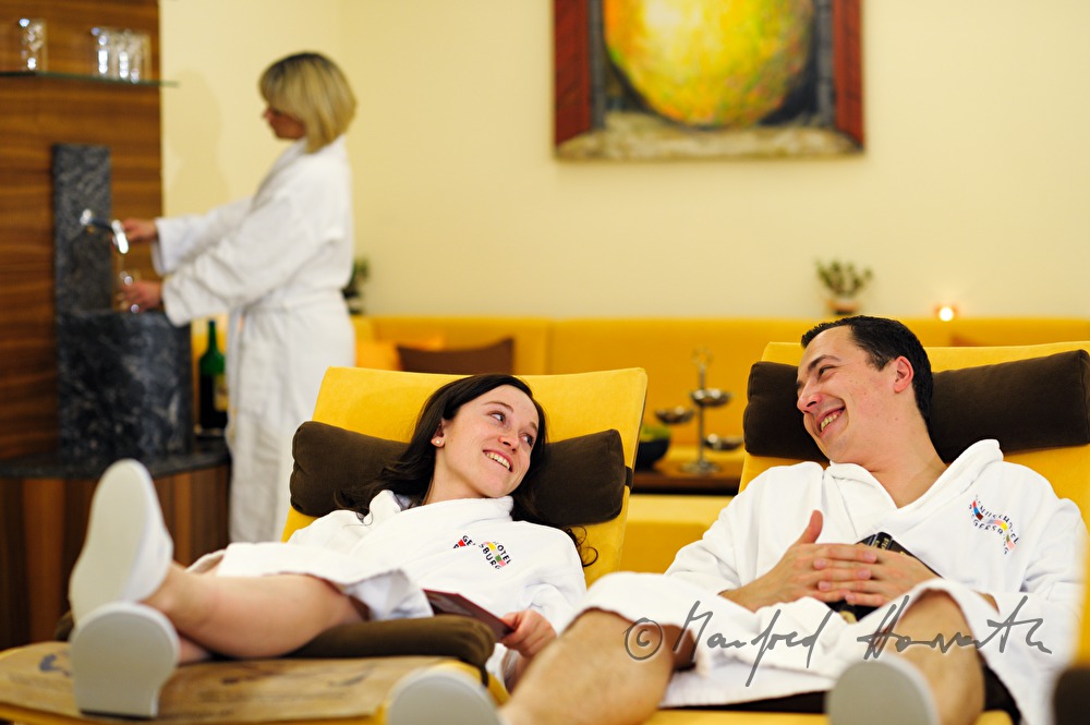 couple rests after a sauna visit