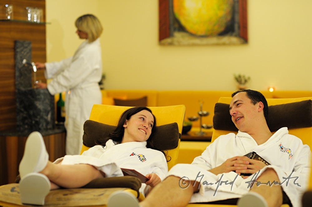 couple rests after a sauna visit