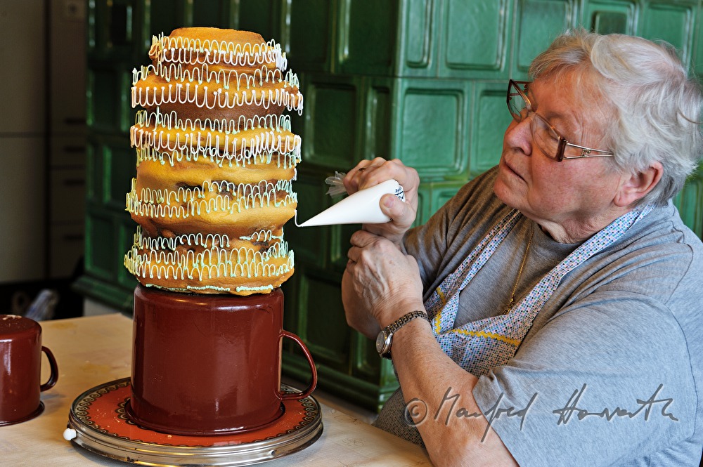 housewife decorating a sweet