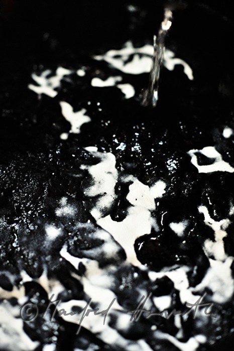 stirring up indigo dye in the blueprint workshop of Wagner family