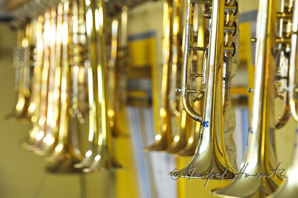 trumpets hanging in the workshop