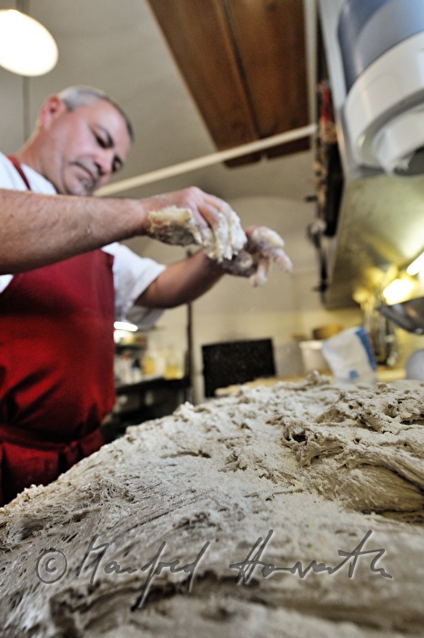 kneading the bread dough for the baking of bread