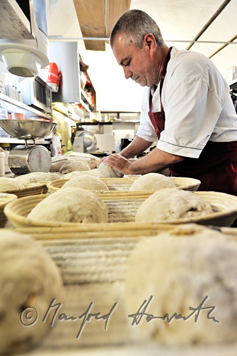 kneading the bread dough for the baking of bread
