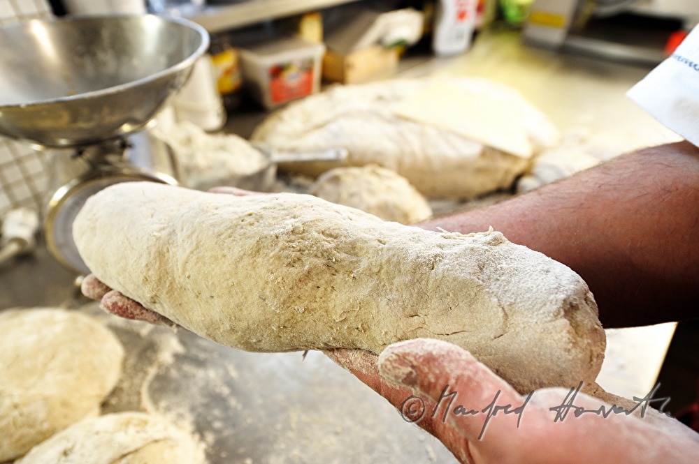 kneading the bread dough for the baking of bread