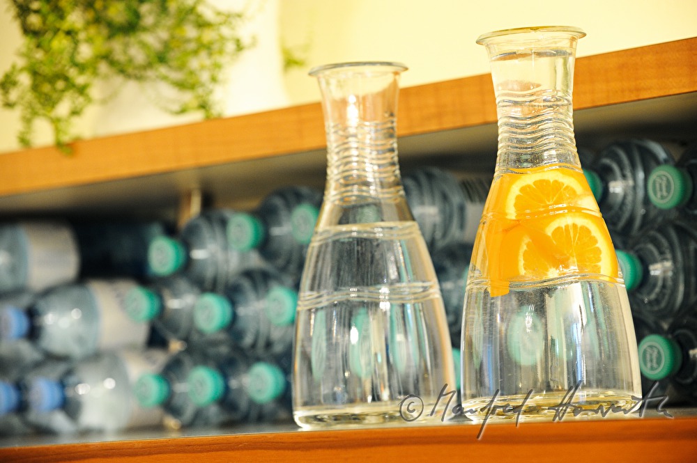 water jars in front of water bottles