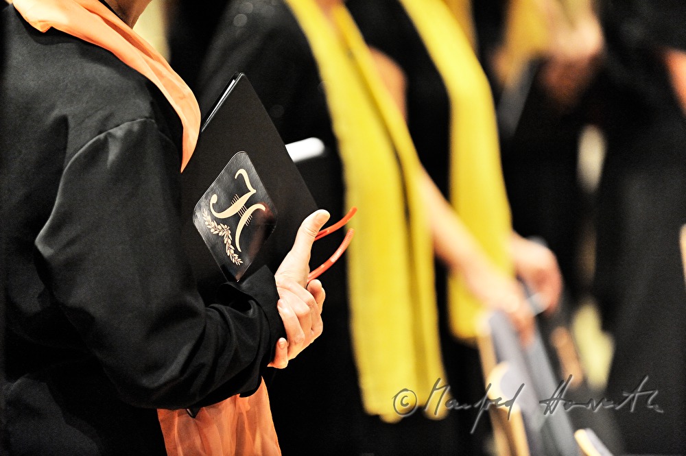 singer of the Haydn Choir with note folder