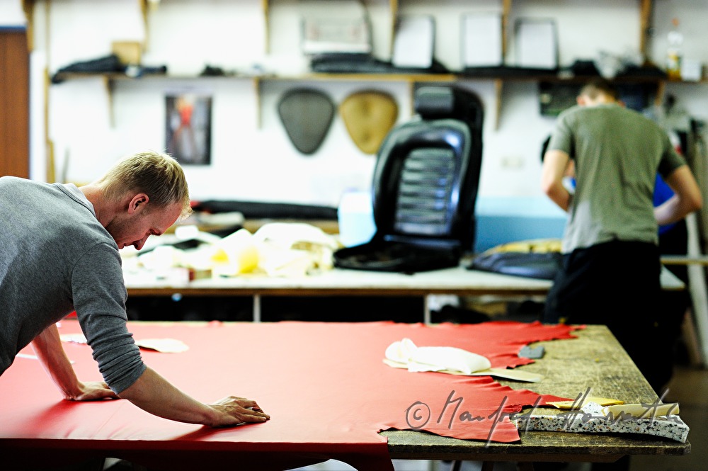 cutting out the parts for a leather covering
