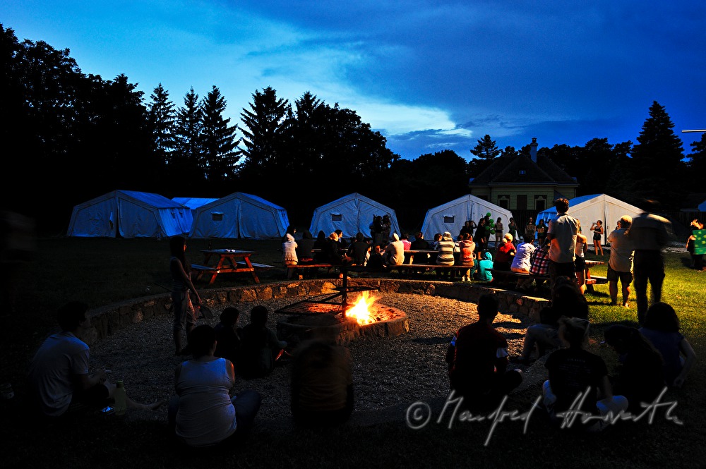camp fire and tents in the National Park Center