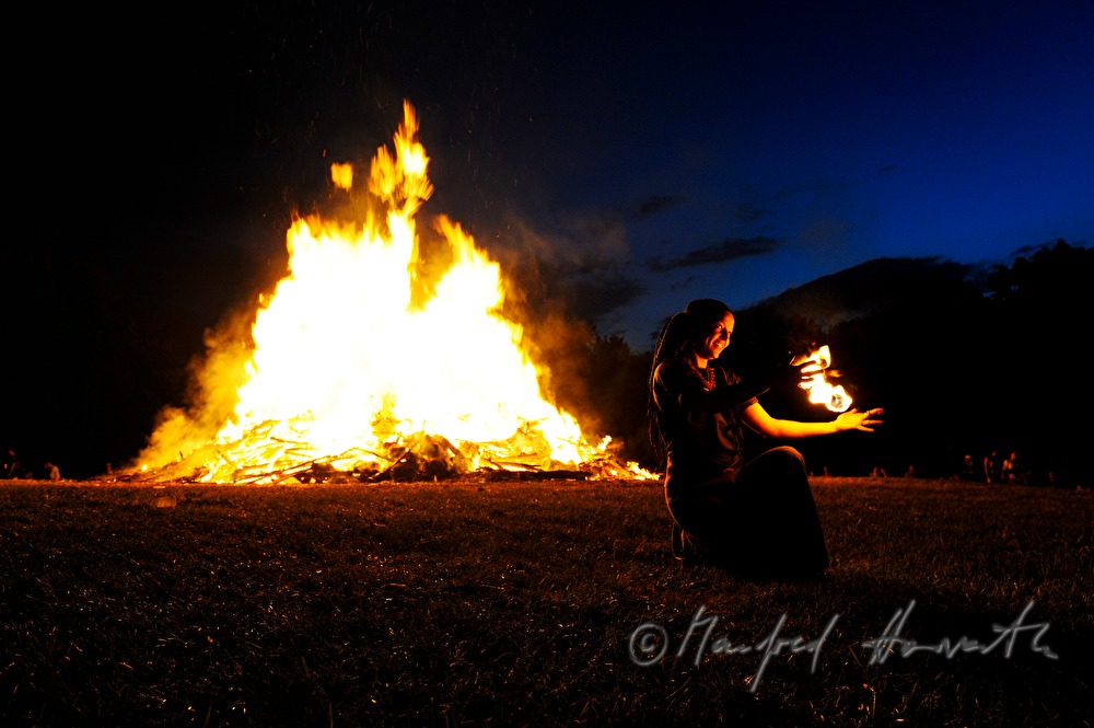juggler dancing near the solstice fire during the Celtic Festival