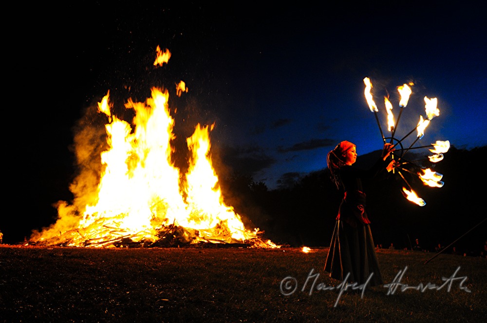 juggler dancing near the solstice fire during the Celtic Festival