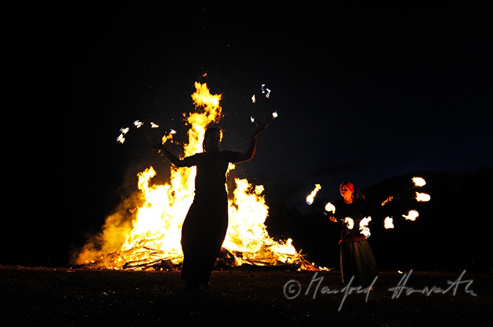 juggler dancing near the solstice fire during the Celtic Festival