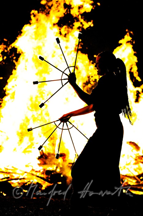 juggler dancing near the solstice fire during the Celtic Festival
