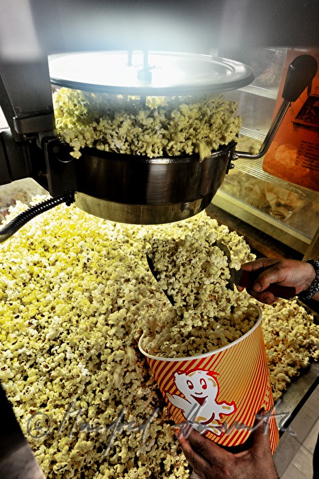 filling in popcorn in a jar in the Cafeteria