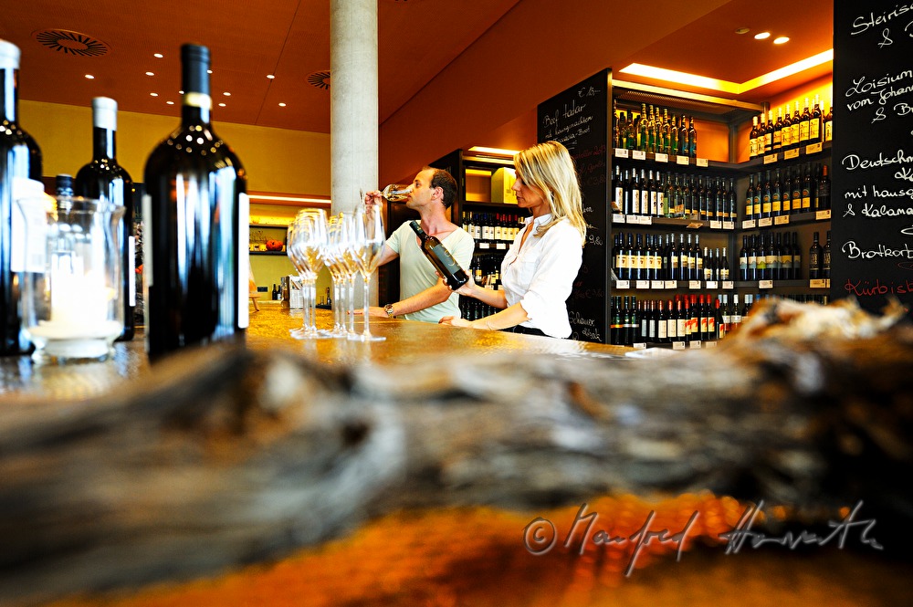 vistors tasting wine in the wine store