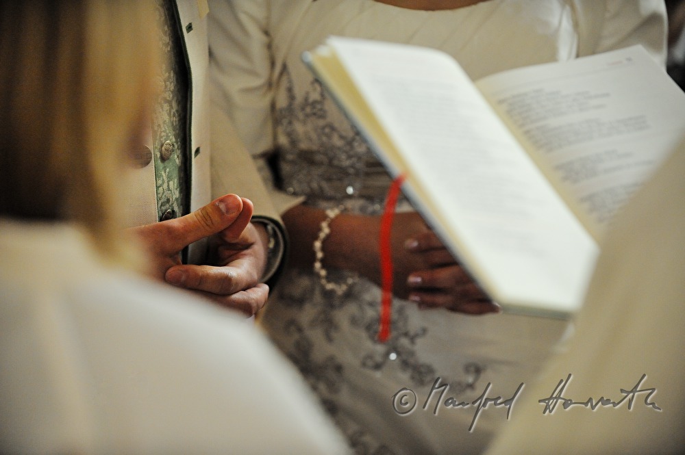 bride and groom at the marriage ceremony in the church