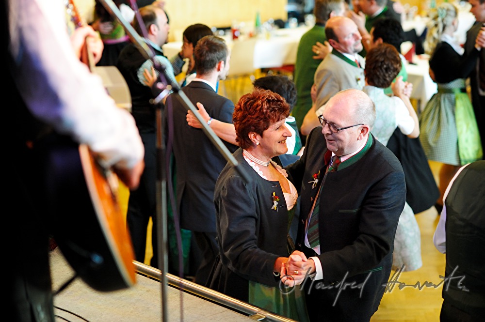 wedding guests dancing to the folk music