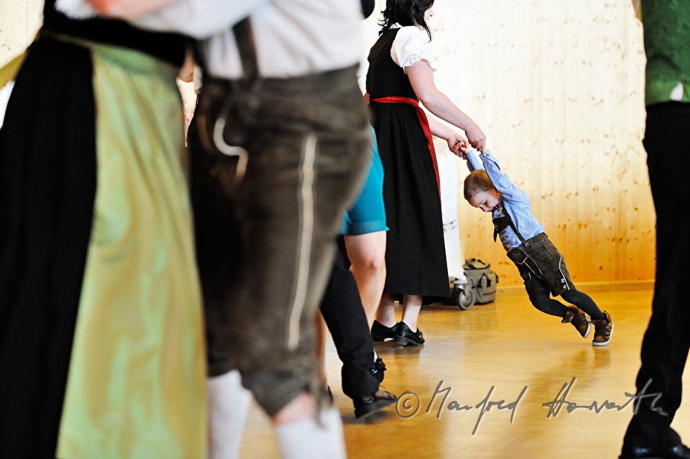 wedding guests dancing to the folk music