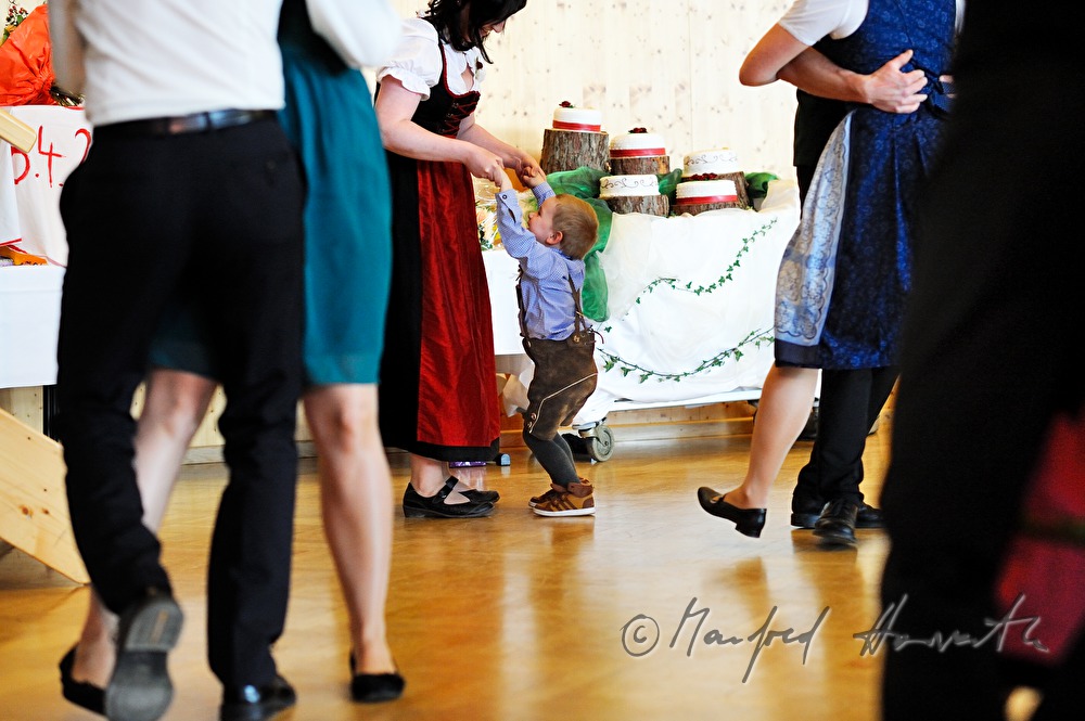 wedding guests dancing to the folk music
