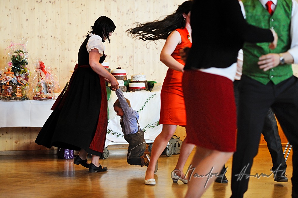 wedding guests dancing to the folk music