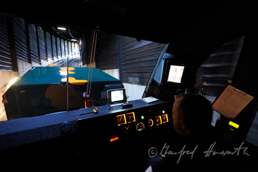 train driver of the cog railway in his cockpit