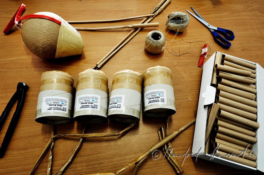 binding the igniter cords of the fireworks rockets