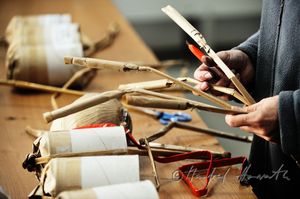 binding the igniter cords of the fireworks rockets