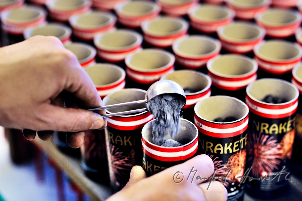 filling the fireworks rockets with black powder